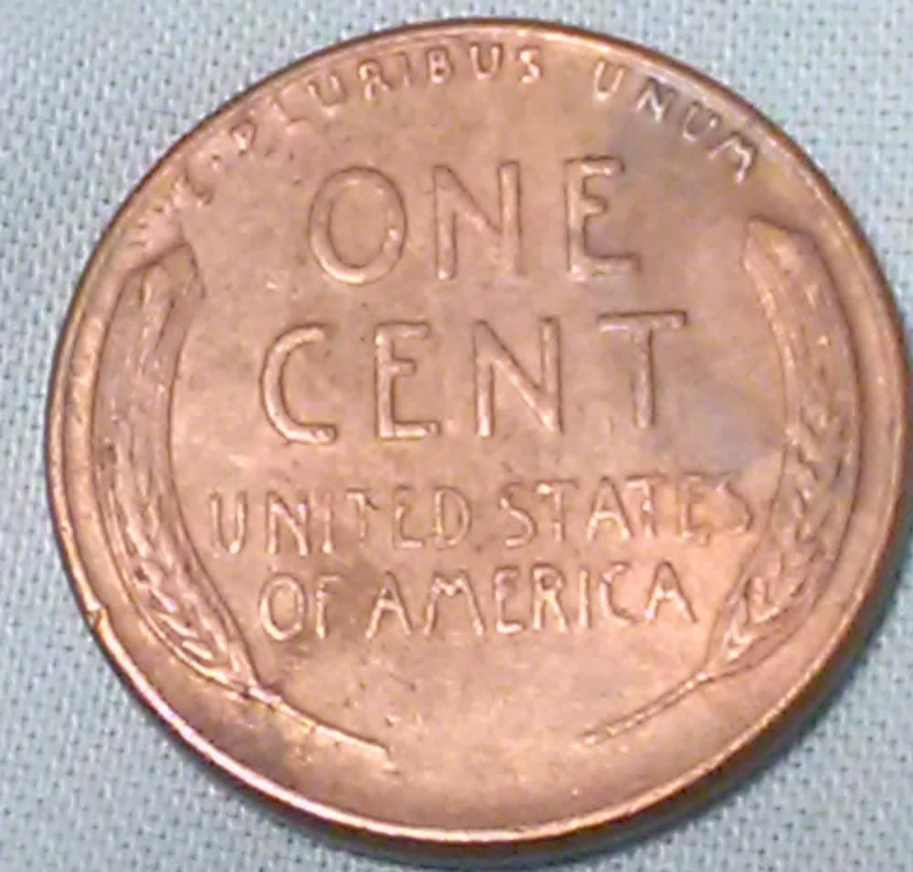1955-P-Lincoln-Wheat-Cent-With-Severe-Cracked-Skull-And-A-RIDB-On-Reverse